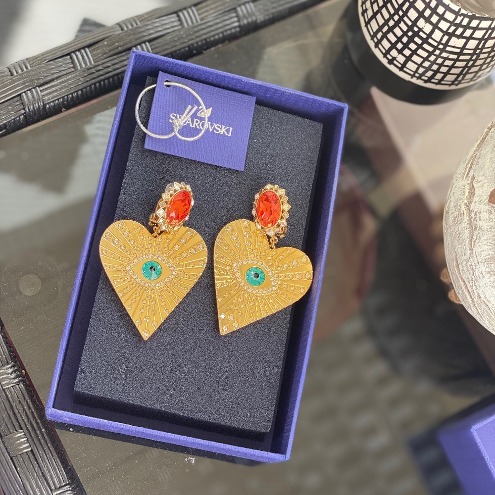Swarovski  goddess evil eye heart earrings .